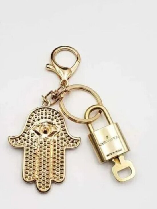 Authentic Louis Vuitton Gold Lock & Key 🔑 w/ Unbranded Evil  Louis Vuitton Gold Lock 🔒 Authentic LV Key + Unbranded Evil Eye Bag Charm